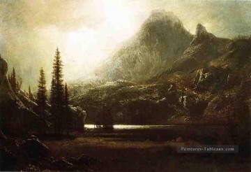 Par un lac de montagne Albert Bierstadt Peinture à l'huile